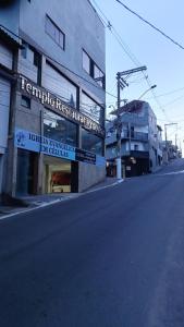 an empty street in front of a building at Riviera Sanary 1208 Nova Almeida in Serra