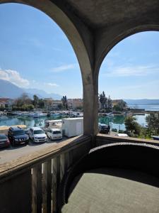 a balcony with a view of a marina at Villa Nela in Tivat