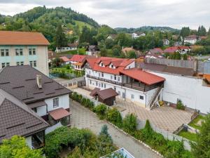 an aerial view of a town with houses at Residence Deluxe Benamino in Bran