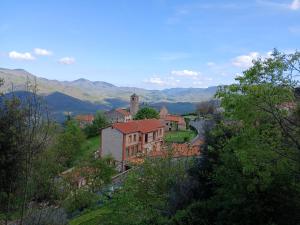 a view of a town with mountains in the background at Gite Thérèse in Montferrer