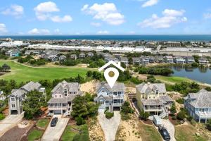 an aerial view of a home with a map on it at 5592 - Windjammer in Nags Head