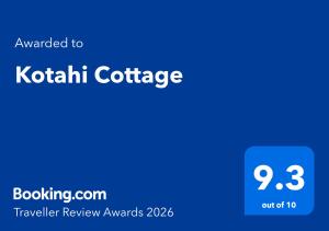 a blue screen with the textouched to kuthiki coffee at Kotahi Cottage in Cambridge