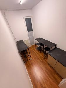 an overhead view of a room with a table and chairs at Zamkowy Hostel Gdansk Old Town in Gdańsk