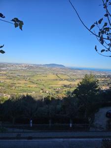 a view from the top of a hill with fields at I Tre Mori in Recanati