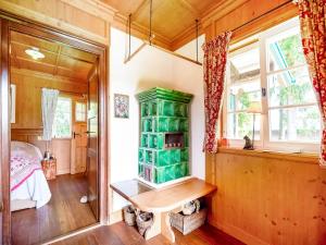 a room with a table and a bed and a window at Rustikaler Bauernhof am Ammersee in Pähl +32 photos