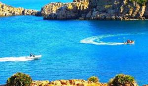 two boats on a large body of water at ksour in Tunis
