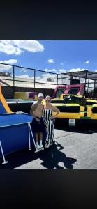 two men standing next to each other on a playground at hostal y centro de eventos in Chorrillos +5 photos