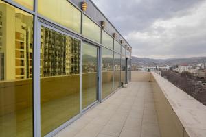 a view from the balcony of a building at Golden Palace Hotel in Tbilisi City