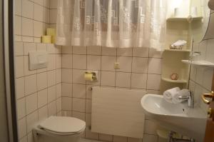 Koupelna v ubytování Appartements Mantinger