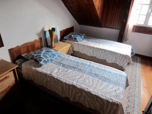 Postel nebo postele na pokoji v ubytování Sweet Home