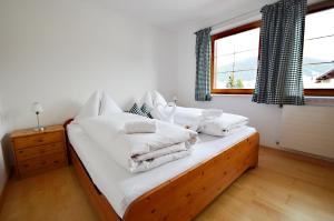 Postel nebo postele na pokoji v ubytování Appartements Mantinger