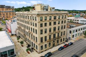 an overhead view of a large building in a city at The Maverick By Kasa in Pittsburgh