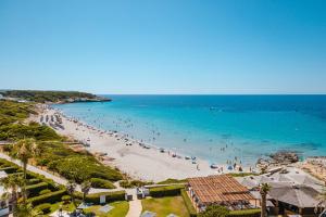 a view of a beach with people in the water at Villa Santo Tomás - Loli in Santo Tomás