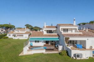 an aerial view of a house with a swimming pool at Casa Mimosa by Algarve Holidays in Vale do Lobo