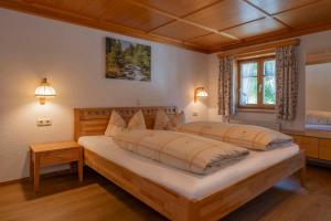 a bedroom with two beds in a room at Landhaus Barbara in Silbertal