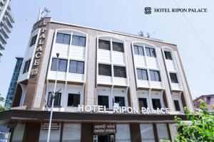 a building with the hotel imperial palace on it at Hotel Ripon Palace in Mumbai