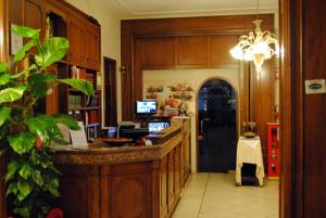 Telewizja i/lub zestaw kina domowego w obiekcie Hotel Domus