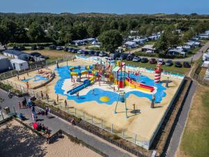 an aerial view of a playground at a park at Duinhoeve chalet Schelp in Burgh Haamstede