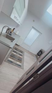 a kitchen with a sink and a sinkessment at Mountain Retreat in Vulcan