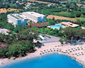 an aerial view of a resort with a beach at Continental Palace in Psalidi
