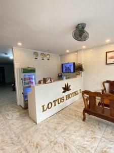 a liquor store with a lottoroth machine in a room at LotusHotel 2 in Ho Chi Minh City