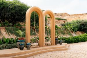 a gazebo with chairs and vases at Hotel Dakhla Club & SPA in Dakhla