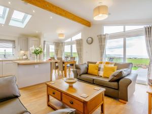 a living room with a couch and a table at 2 Bed in Newton Stewart oc-79129 in Gillespie