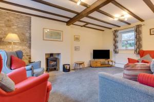 a living room with two couches and a tv at 3 Bed in Catterick oc-ds934 in Catterick Bridge