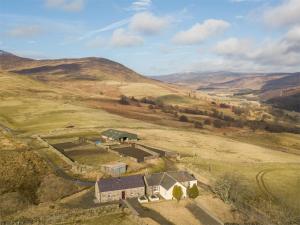 an aerial view of a farm in a field at 1 Bed in Edzell oc-ca335 in Edzell +5 photos