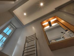 a bathroom with a mirror and a ladder at 1 Bed in Spark Bridge oc-lcc52 in Spark Bridge +27 photos