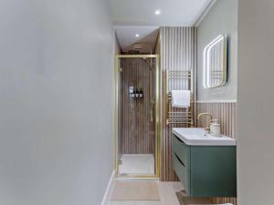 a bathroom with a shower and a sink at 3 Bed in Gullane oc-96141 in Gullane +23 photos