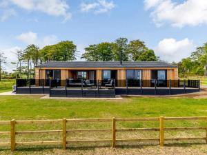 a house with a black roof at 2 Bed in Anstruther oc-83173 in Anstruther
