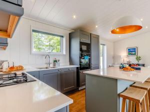 a kitchen with a sink and a counter top at 2 Bed in Anstruther oc-83173 in Anstruther