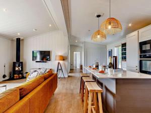 a large living room with a couch and a kitchen at 2 Bed in Anstruther oc-83174 in Anstruther