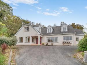 a large white house with a gravel driveway at 5 Bed in Mountcharles oc-ii11344 in Mountcharles