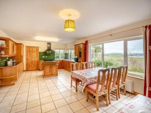 a kitchen and dining room with a table and chairs at 5 Bed in Mountcharles oc-ii11344 in Mountcharles