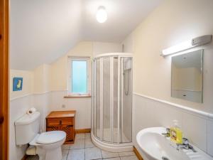 a bathroom with a shower and a toilet and a sink at 5 Bed in Mountcharles oc-ii11344 in Mountcharles +17 photos