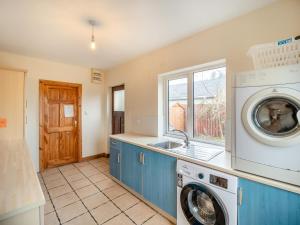 a kitchen with a washing machine and a sink at 5 Bed in Mountcharles oc-ii11344 in Mountcharles