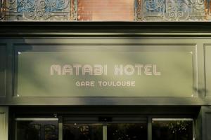 a sign for a marriott hotel cape town at Matabi Hotel Toulouse Gare by HappyCulture in Toulouse
