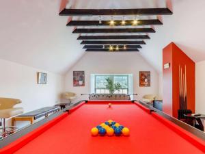 a pool table with balls on it in a room at 4 Bed in Pitlochry oc-ca274 in Foss