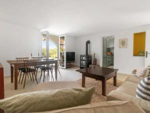 a living room with a couch and a table at El Dorado in Premantura