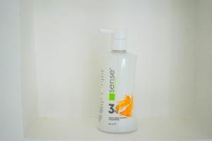 a bottle of detergent sitting on a white table at Spacious 3BR, 2BT with 5 balconies in Bucharest