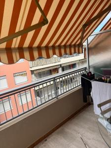 a balcony with a view of a building at Le belgique ,1 minute plage in Vallauris