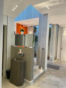 a bathroom with a sink in a building at Seashell 2nd row sea Villa in El Alamein +19 photos