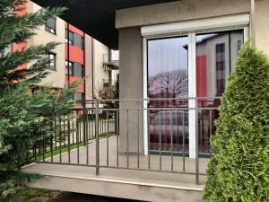 a balcony with a view of a building at Joy City Stay Calea Timisoarei 4 in Timişoara