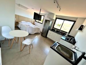 Foto de Residencial Antúrio Studio 103 na rota turística e gastronômica