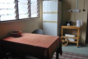 Küche/Küchenzeile in der Unterkunft Borneo Sweet Guesthouse