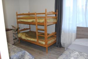 a room with a bunk bed with a bunk bedoublengthngthngthngthngth at SD House in Dilijan
