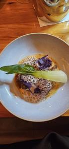 a plate of food on a wooden table at Downings View in Ballynaworthra +23 photos