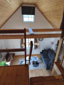 an overhead view of a living room in a tiny house at The Red Butterfly 2 cottage in Månstad